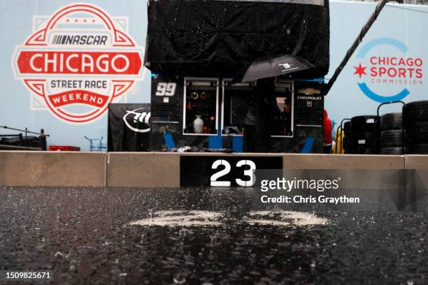 A A general view of pit area for the McDonald's Toyota, during a weather delay of the NASCAR Cup Series Grant Park 220 at the Chicago Street Course...
