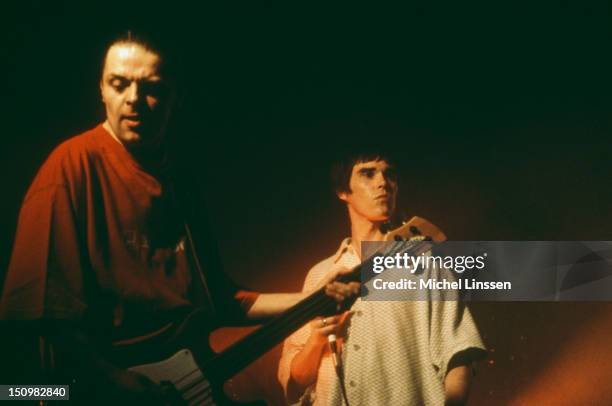 Bassist Mani and singer Ian Brown performing on stage with English rock group the Stone Roses, 1995.