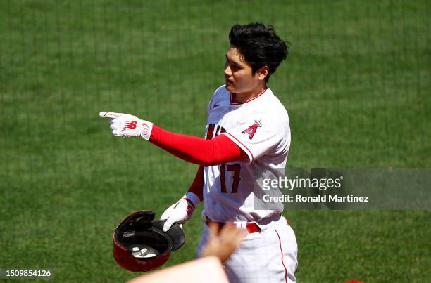 Shohei Ohtani of the Los Angeles Angels celebrates a home run against the Arizona Diamondbacks in the eighth inning at Angel Stadium of Anaheim on...