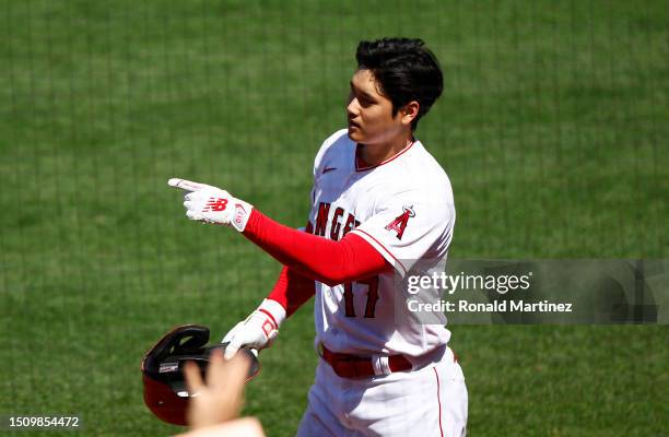 Shohei Ohtani of the Los Angeles Angels celebrates a home run against the Arizona Diamondbacks in the eighth inning at Angel Stadium of Anaheim on...