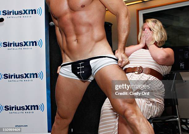 Cosmo Radio's 'Wake Up with Taylor' hosts a 'Magic Mike' style male revue for an audience of fans at the SiriusXM Studio on August 29, 2012 in New...