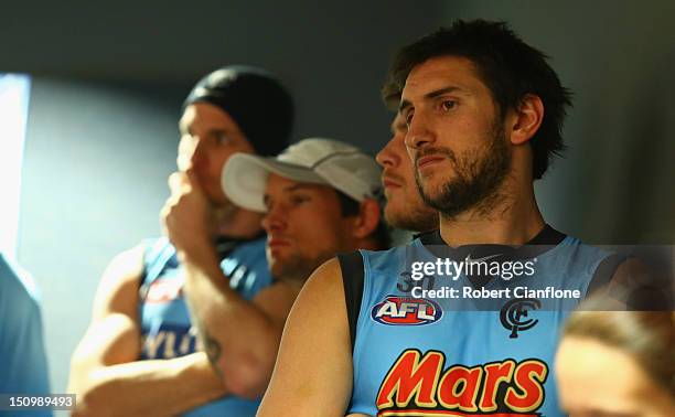 Jarrad Waite of the Blues looks on as Brett Ratten coach of the Blues speaks to the media after he was sacked as coach during a Carlton Blues AFL...