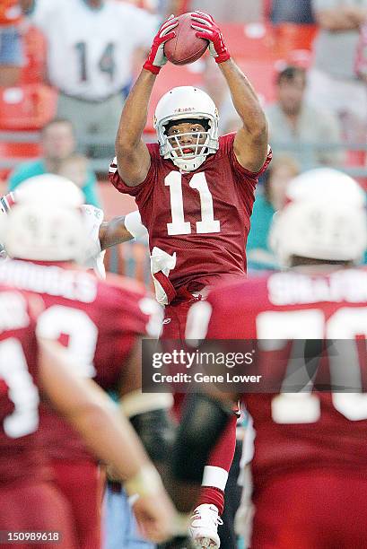 Arizona Cardinals Larry Fitzgerald in action, making catch for touchdown vs Miami Dolphins at Pro Player Stadium. Miami, FL 11/7/2004 CREDIT: Gene...