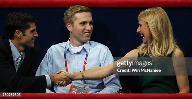 Republican vice presidential candidate, U.S. Rep. Paul Ryan's wife Janna Ryan shakes hands with Matt Romney during the third day of the Republican...