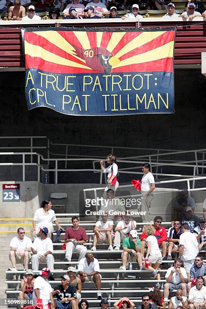 View of banner reading A TRUE PATRIOT: CPL PAT TILLMAN during memorial service for Pat Tillman during halftime of Arizona Cardinals vs New England...