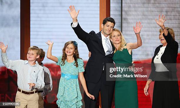 Republican vice presidential candidate, U.S. Rep. Paul Ryan waves with his family daughter, Liza Ryan, sons, Charlie Ryan and Sam Ryan and wife,...