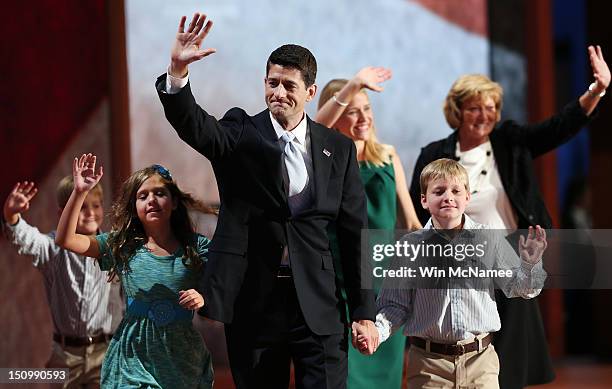 Republican vice presidential candidate, U.S. Rep. Paul Ryan waves with his family, daughter, Liza Ryan, sons, Charlie Ryan and Sam Ryan and wife,...