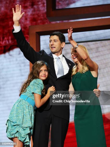 Republican vice presidential candidate, U.S. Rep. Paul Ryan waves with his wife, Janna Ryan and daughter Liza Ryan during the third day of the...