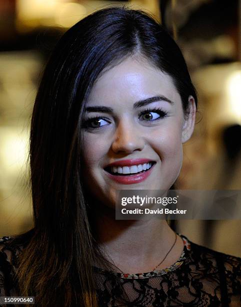 Actress Lucy Hale arrives for the grand opening of Henri Bendel at the Fashion Show mall on August 29, 2012 in Las Vegas, Nevada.