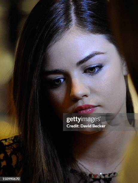 Actress Lucy Hale arrives for the grand opening of Henri Bendel at the Fashion Show mall on August 29, 2012 in Las Vegas, Nevada.