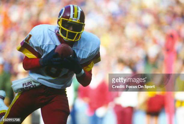 Wide Receiver Art Monk of the Washington Redskins catches a pass during an NFL football game at RFK Stadium circa 1988 in Washington, D.C.. Monk...