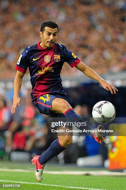 Pedro Rodriguez Ledesma of FC Barcelona controls the ball during the Supercopa second leg match between Real Madrid and Barcelona at Estadio Santiago...