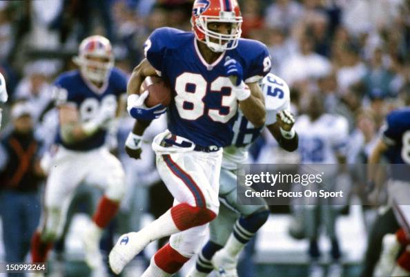 Dy Reed Andre Reed of the Buffalo Bills runs with the ball after a catch ...