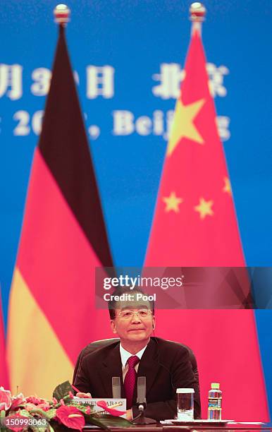 Chinese Premier Wen Jiabao is seen during bilateral talks with German Chancellor Angela Merkel inside the Great Hall of the People on August 30, 2012...