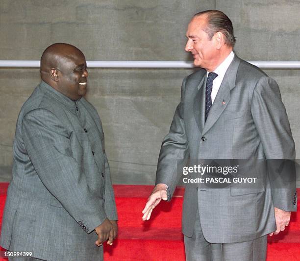 French President Jacques Chirac greets Laurent Desire Kabila , President of the Demoratic Republic of Congo at the opening of the 20th Franco-African...