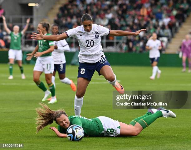 Kyra Carusa of Republic of Ireland and Estelle Cascarino of France battle for the ball during the international women's football friendly match...