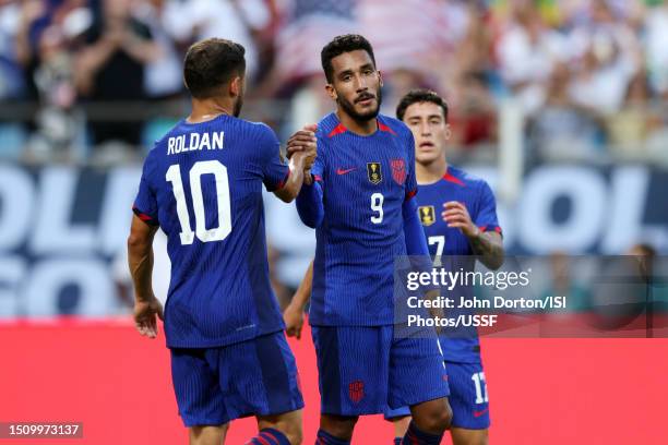 Jesús Ferreira of the United States celebrates scoring with Cristian Roldan during the first half of a Group A - 2023 Concacaf Gold Cup match against...