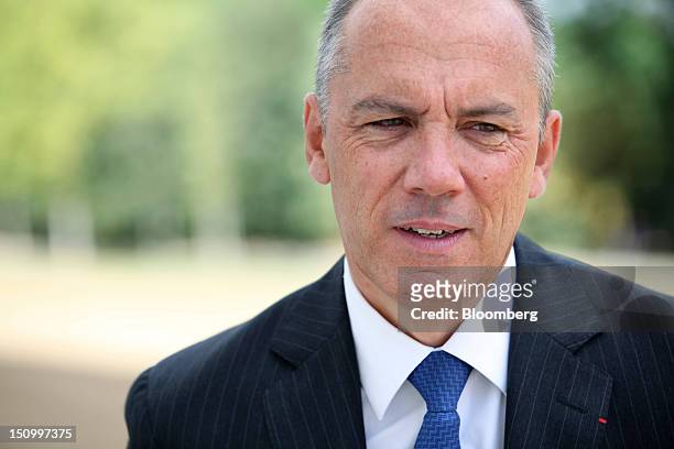 Stephane Richard, chief executive officer of France Telecom SA, poses for a photograph during the Mouvement des Enterprises de France conference at...