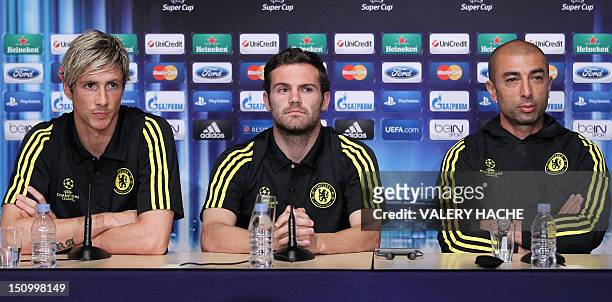 Chelsea's Spanish forward Fernando Torres , Chelsea's Spanish midfielder Juan Mata and coach Roberto Di Matteo listen during a press conference on...