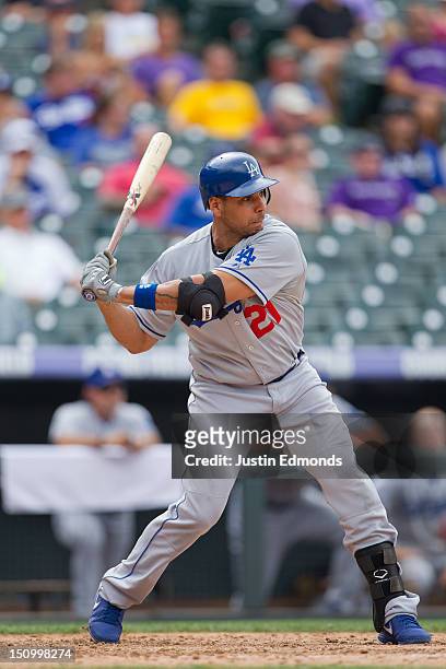 Juan Rivera of the Los Angeles Dodgers bats against the Colorado Rockies at Coors Field on August 29, 2012 in Denver, Colorado. The Dodgers defeated...
