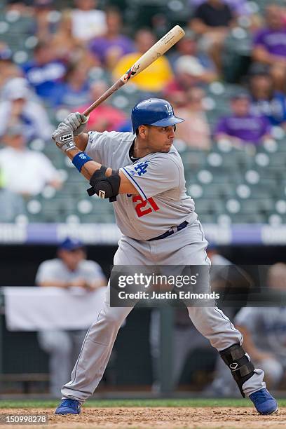 Juan Rivera of the Los Angeles Dodgers bats against the Colorado Rockies at Coors Field on August 29, 2012 in Denver, Colorado. The Dodgers defeated...