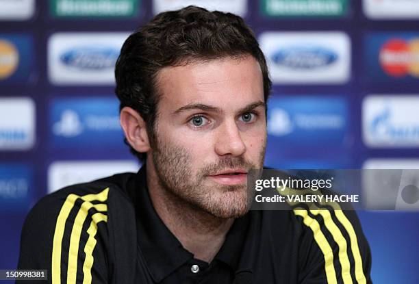 Chelsea's Spanish midfielder Juan Mata attends a press conference on the eve of the UEFA Super Cup football match Chelsea FC vs Club Atletico de...