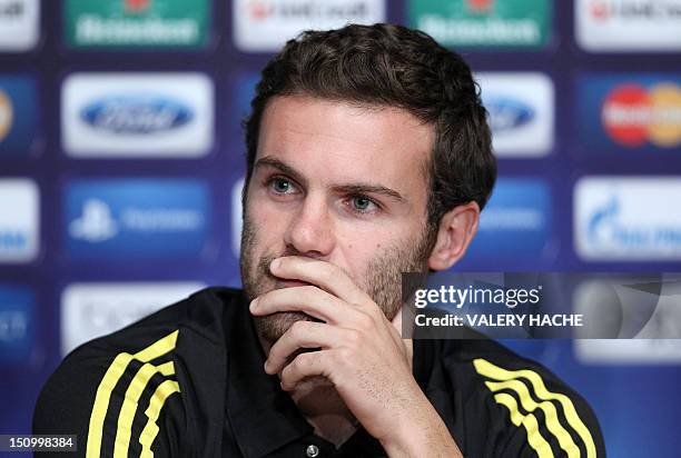 Chelsea's Spanish midfielder Juan Mata attends a press conference on the eve of the UEFA Super Cup football match Chelsea FC vs Club Atletico de...