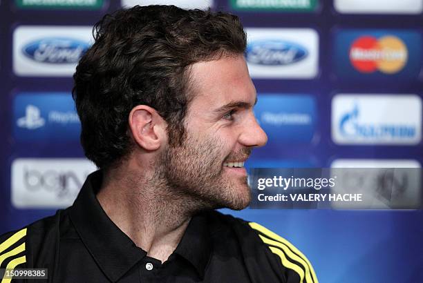 Chelsea's Spanish midfielder Juan Mata attends a press conference on the eve of the UEFA Super Cup football match Chelsea FC vs Club Atletico de...