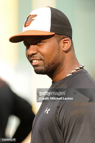 Wilson Betemit of the Baltimore Orioles looks on before a baseball game against the Chicago White Sox on August 28, 2012 at Orioles Park at Camden...