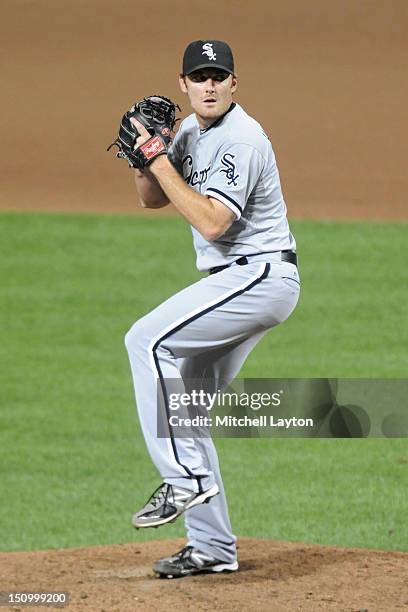 Philip Humber of the Chicago White Sox pitches during a baseball game against the Baltimore Orioles on August 28, 2012 at Orioles Park at Camden...