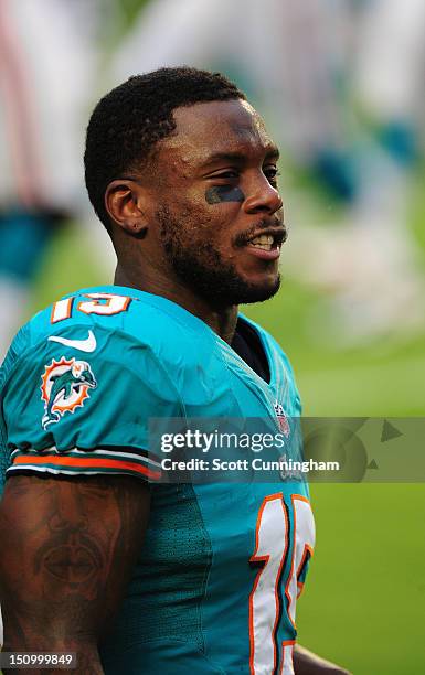 Davone Bess of the Miami Dolphins warms up before the game against the Atlanta Falcons at Sun Fife Stadium on August 24, 2012 in Miami Gardens,...