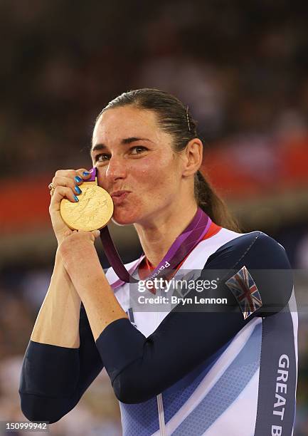 Gold medalist Sarah Storey of Great Britain poses on the podium during the victory ceremony for the Women's Individual C5 Pursuit Cycling on day 1 of...