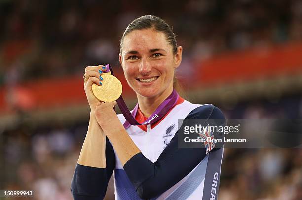 Gold medalist Sarah Storey of Great Britain poses on the podium during the victory ceremony for the Women's Individual C5 Pursuit Cycling on day 1 of...