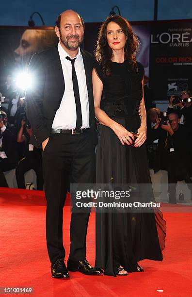 Actor Kad Merad and Emmanuelle Cosso Merad attend "Superstar" Premiere during The 69th Venice Film Festival at the Palazzo del Cinema on August 30,...