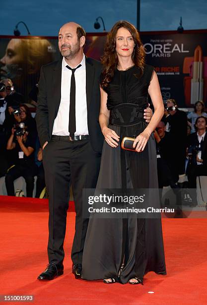 Actor Kad Merad and Emmanuelle Cosso Merad attend "Superstar" Premiere during The 69th Venice Film Festival at the Palazzo del Cinema on August 30,...