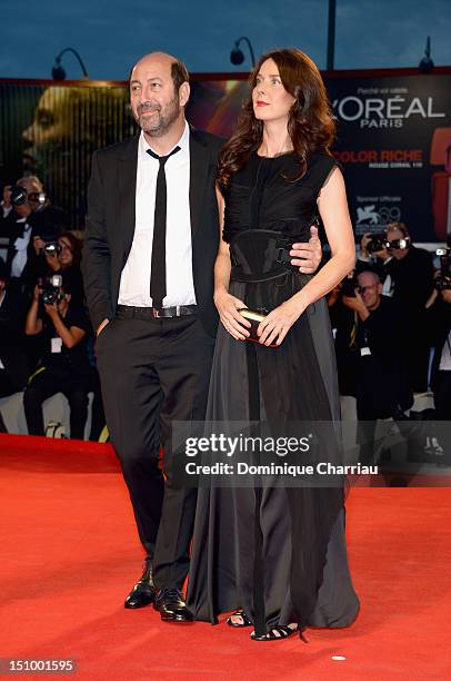 Actor Kad Merad and Emmanuelle Cosso Merad attend "Superstar" Premiere during The 69th Venice Film Festival at the Palazzo del Cinema on August 30,...