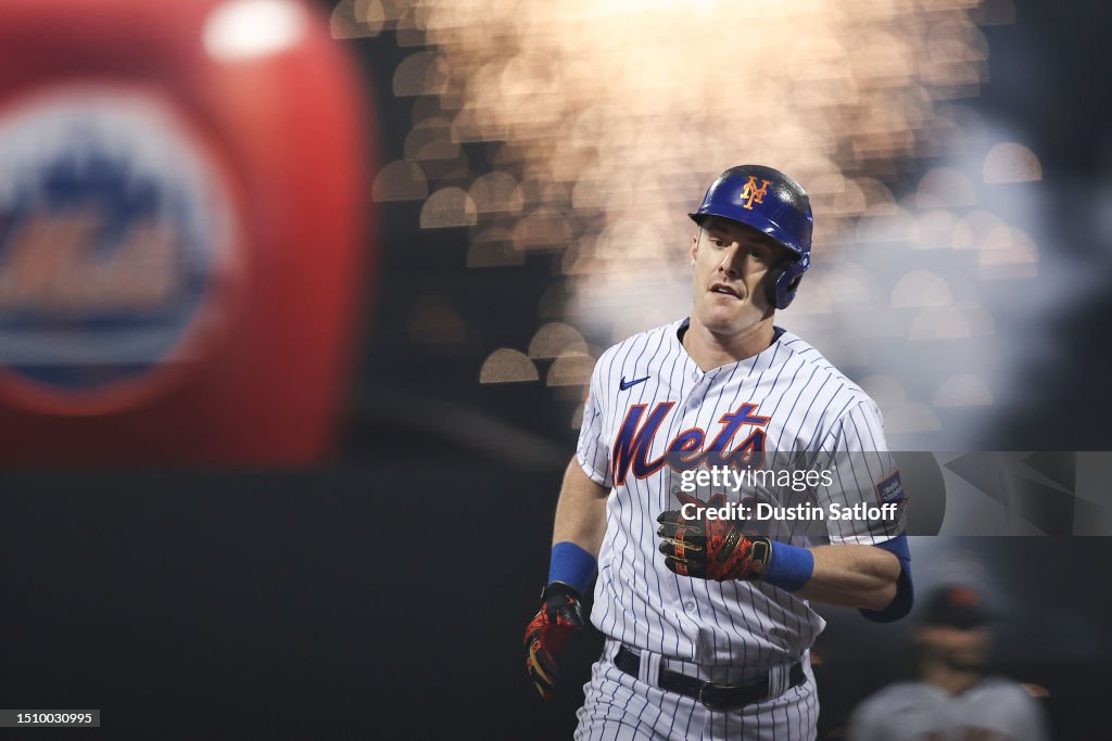 Mark Canha of the New York Mets rounds the bases after hitting a home  News Photo - Getty Images