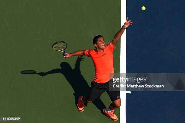 Nicolas Almagro of Spain serves during his men's singles second round match against Philipp Petzschner of Germany on Day Four of the 2012 US Open at...