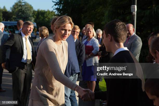 Princess Charlene of Monaco present a Variety Children's Charity sunshine coach to pupils and staff from Greenhill Primary School on August 30, 2012...