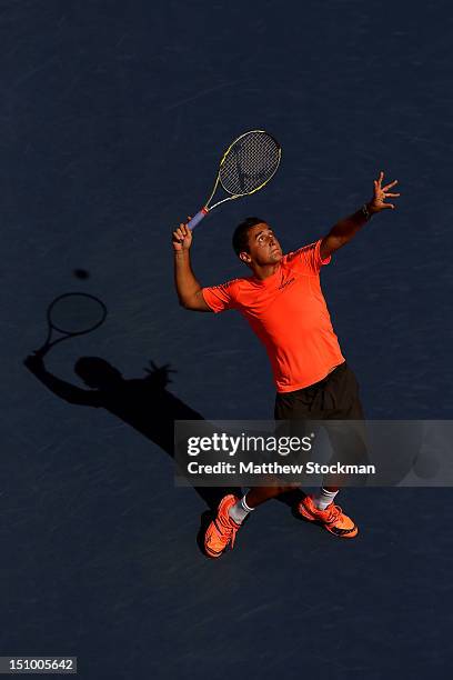 Nicolas Almagro of Spain serves during his men's singles second round match against Philipp Petzschner of Germany on Day Four of the 2012 US Open at...