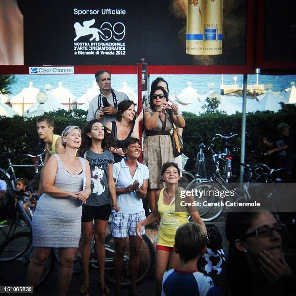 Fans watch 'The Reluctant Fundamentalist' Premiere and Opening Ceremony during the 69th Venice International Film Festival at Palazzo del Cinema on...