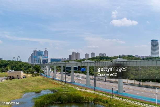 The futuristic Optics Valley sky train conducts trial runs on July 2, 2023 in Wuhan, Hubei Province of China. The train serves as a part of a 26.7...