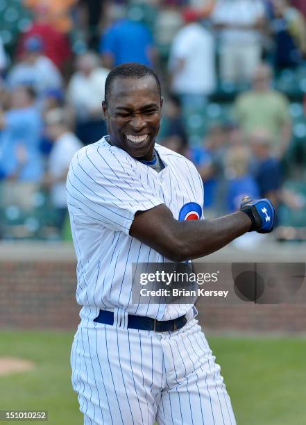 Alfonso Soriano of the Chicago Cubs celebrates after hitting a game-winning RBI single scoring Starlin Castro during the ninth inning against the...