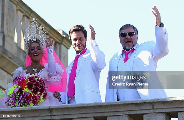 Jackie O, Lee Henderson and Kyle Sandilands wave to the crowd during Kyle & Jackie O's Big Fat Gypsy Wedding at Curzon Hall, Marsfield on August 31,...