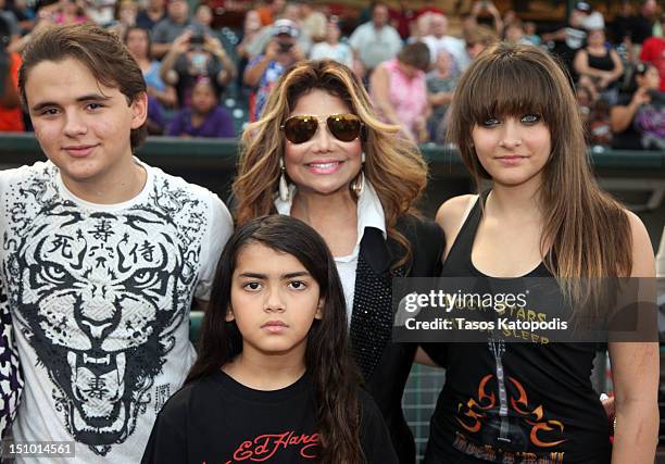 Prince Jackson, La Toya Jackson, Prince Michael Jackson II and Paris Jackson attend the St. Paul Saints Vs. The Gary SouthShore RailCats baseball...