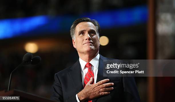 Republican presidential candidate, former Massachusetts Gov. Mitt Romney takes the stage to deliver his nomination acceptance speech during the final...