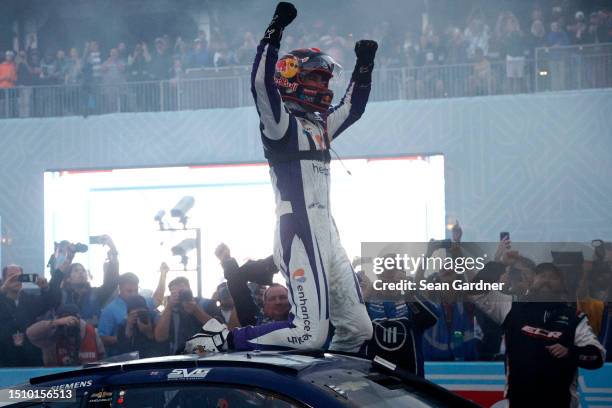 Shane Van Gisbergen, driver of the Enhance Health Chevrolet, celebrates after winning the NASCAR Cup Series Grant Park 220 at the Chicago Street...