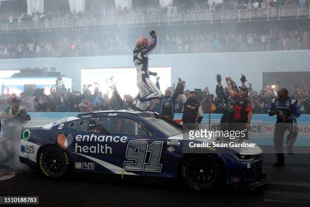 Shane Van Gisbergen, driver of the Enhance Health Chevrolet, celebrates after winning the NASCAR Cup Series Grant Park 220 at the Chicago Street...