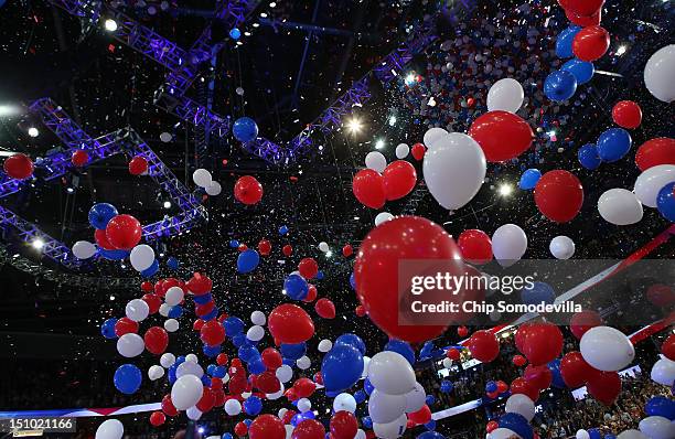 Balloons drop after Republican presidential candidate, former Massachusetts Gov. Mitt Romney accepted the nomination during the final day of the...