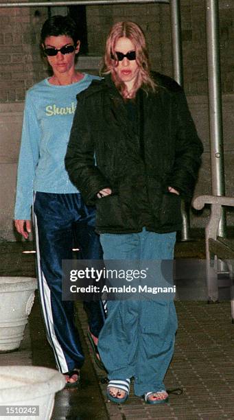 Madonna, right, and Ingrid Casares, both of whom are pregnant, walk together on their way to the doctor, April 8, 2000 in New York City.